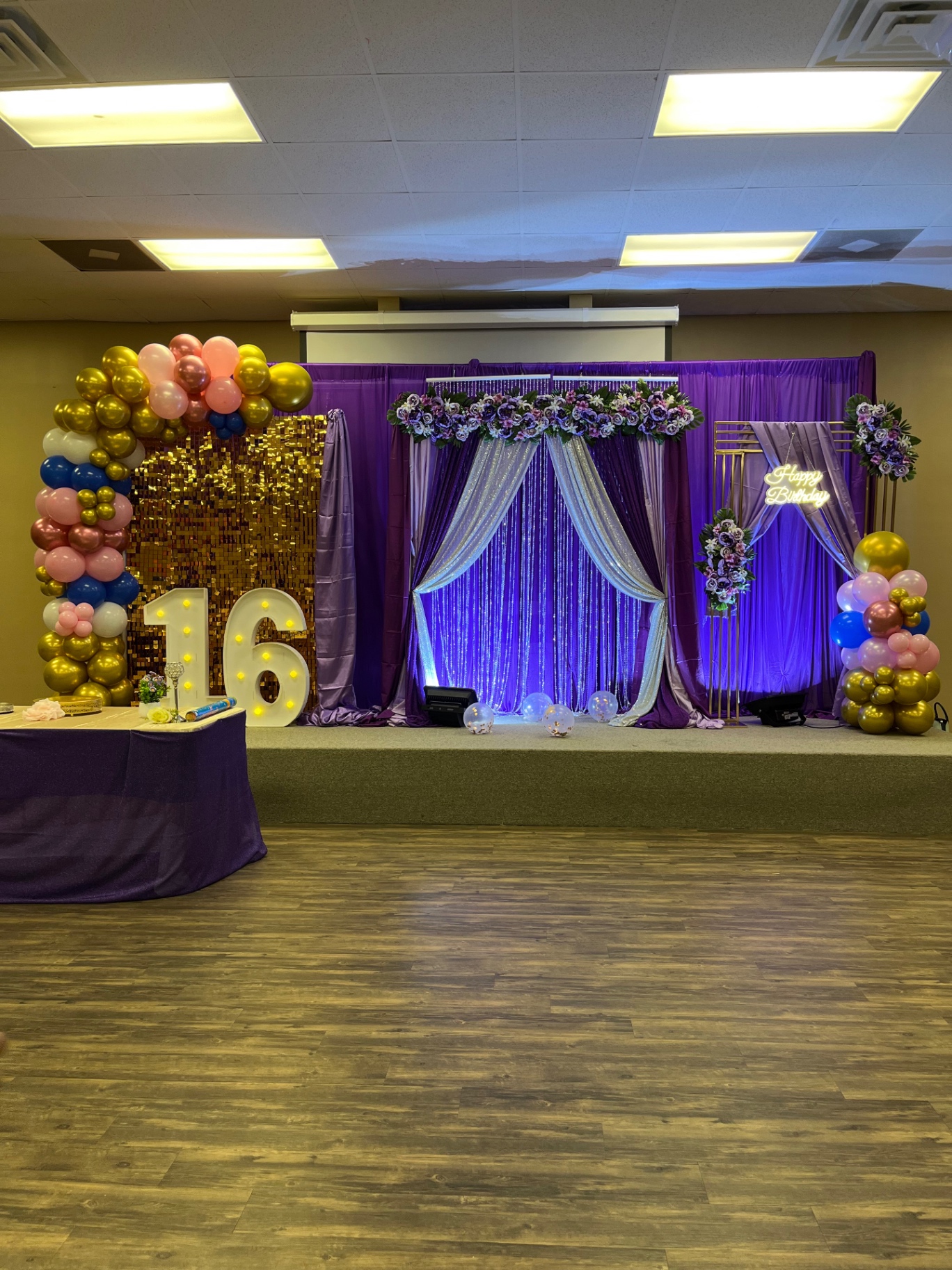 Purple and gold sixteenth birthday stage