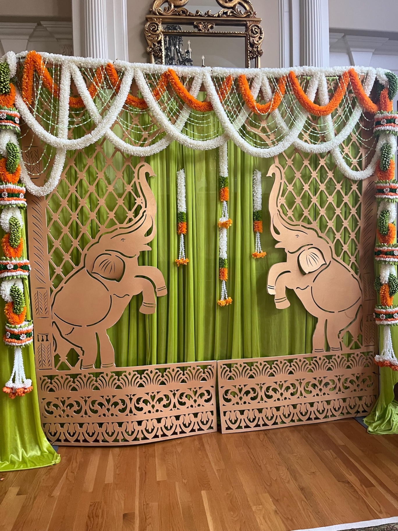 Green Haldi backdrop with copper elephant panels