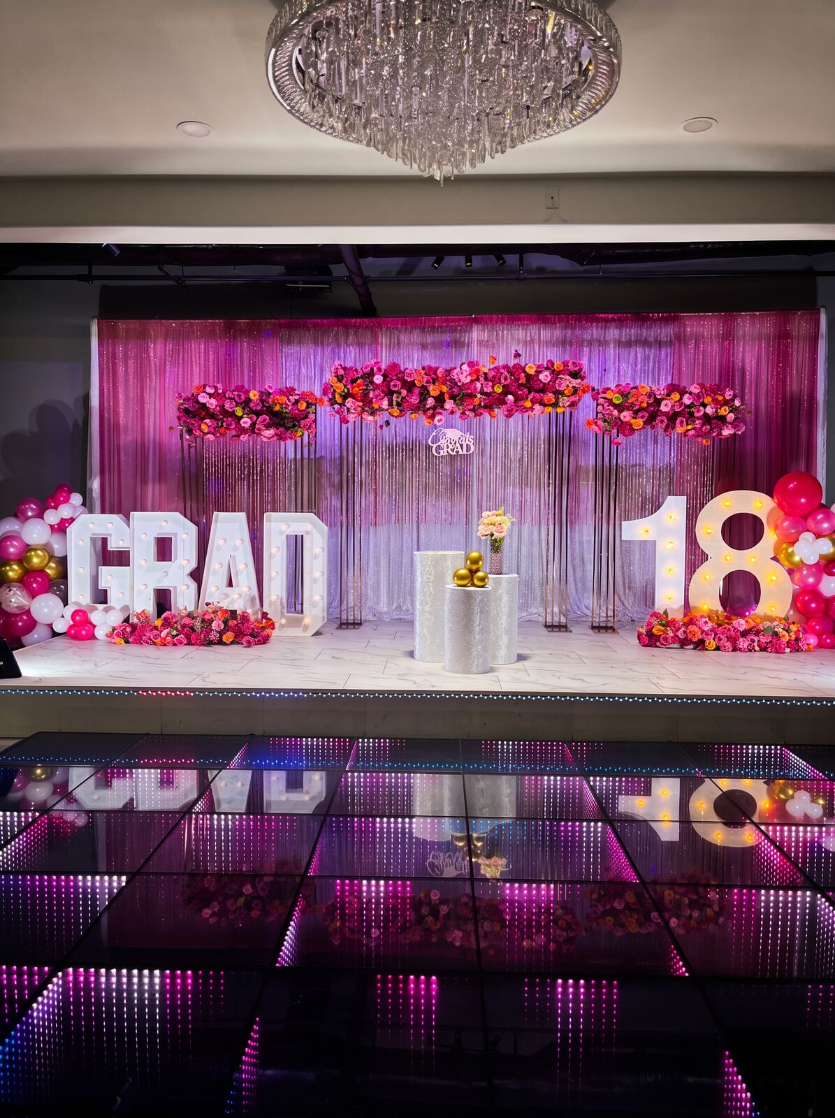 Pink and silver graduation stage