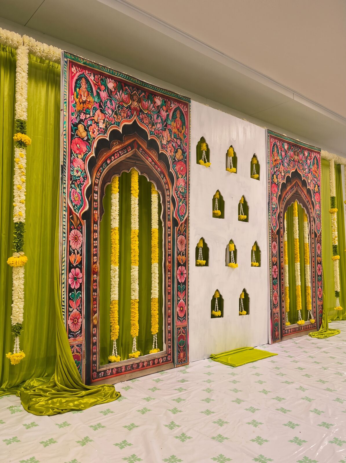 Traditional backdrop with painted arch panels